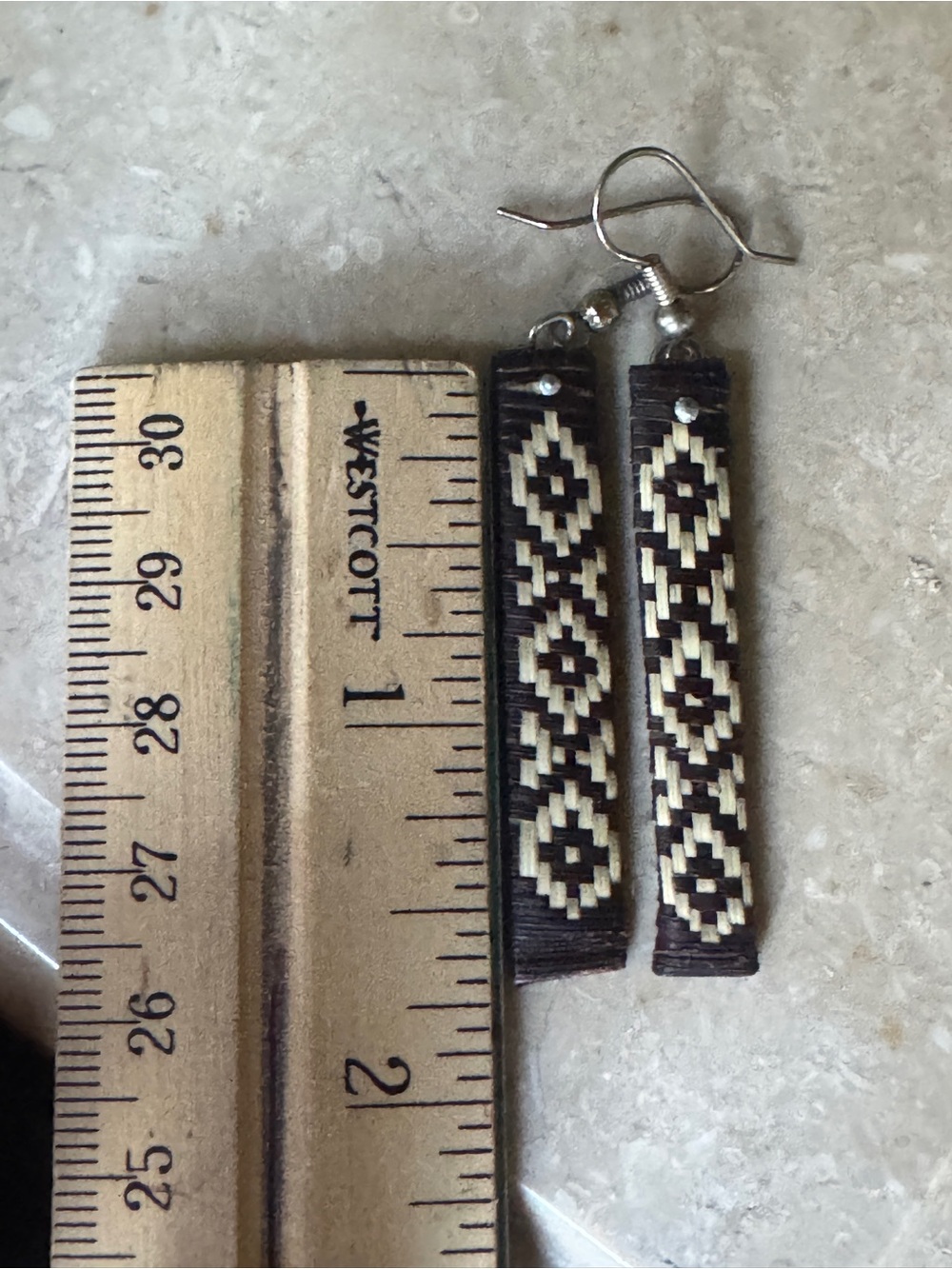 handwoven black and cream geometric earrings and ring from south america